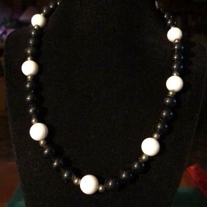 White, black and brass plastic bead necklace 18”